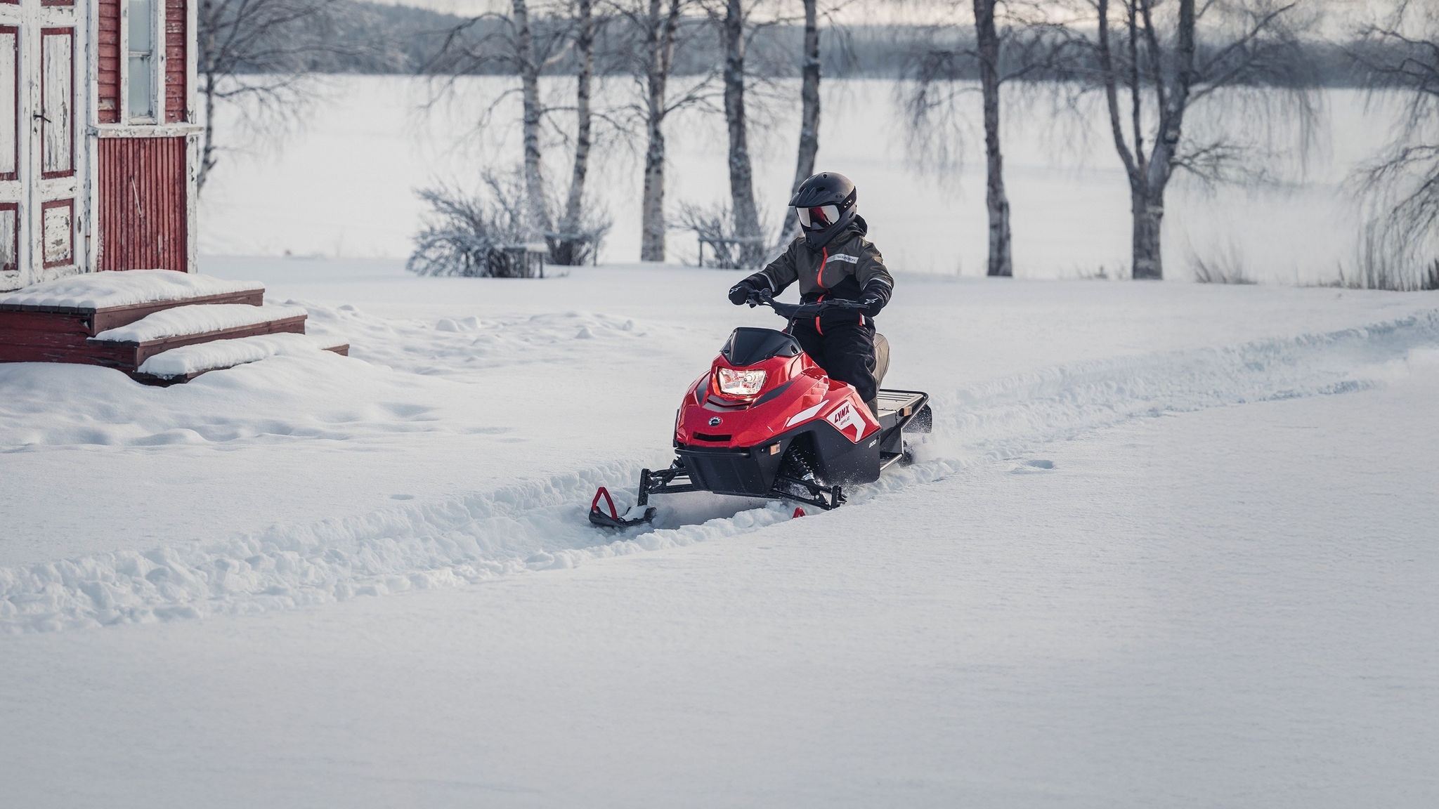 Kids riding on the yard with Lynx Rave 200