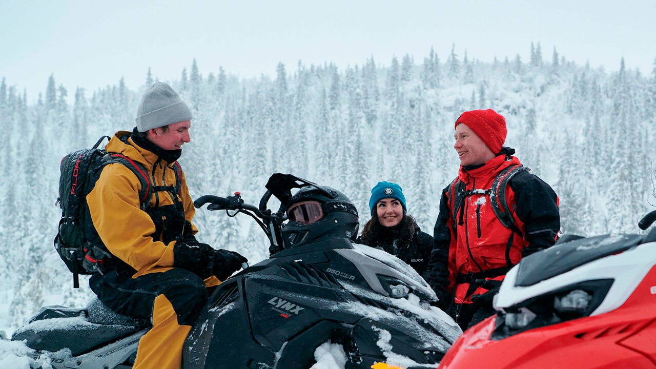 Three Lynx riders on a break