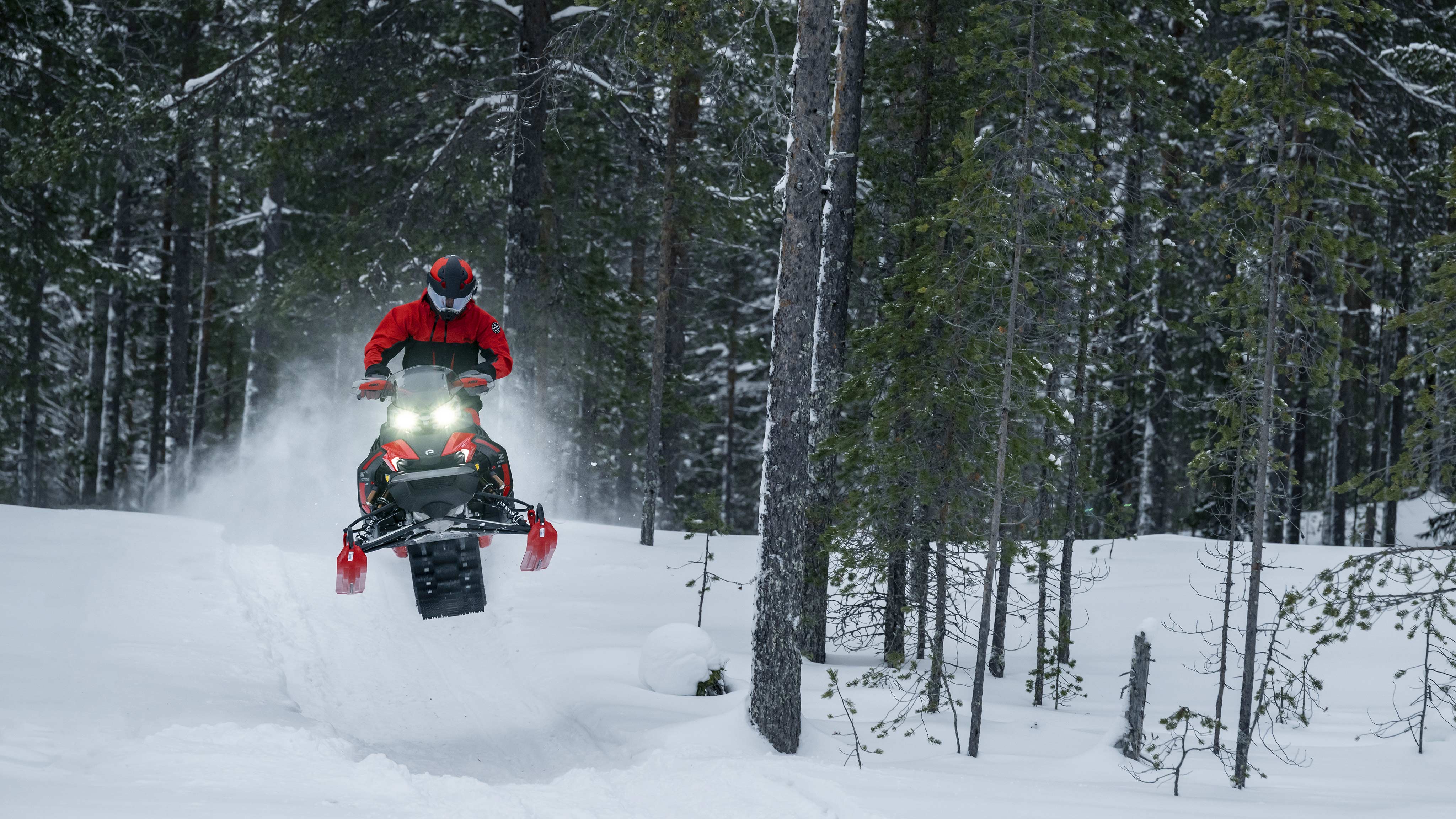 Man jumping in trail with the Lynx Xterrain RE