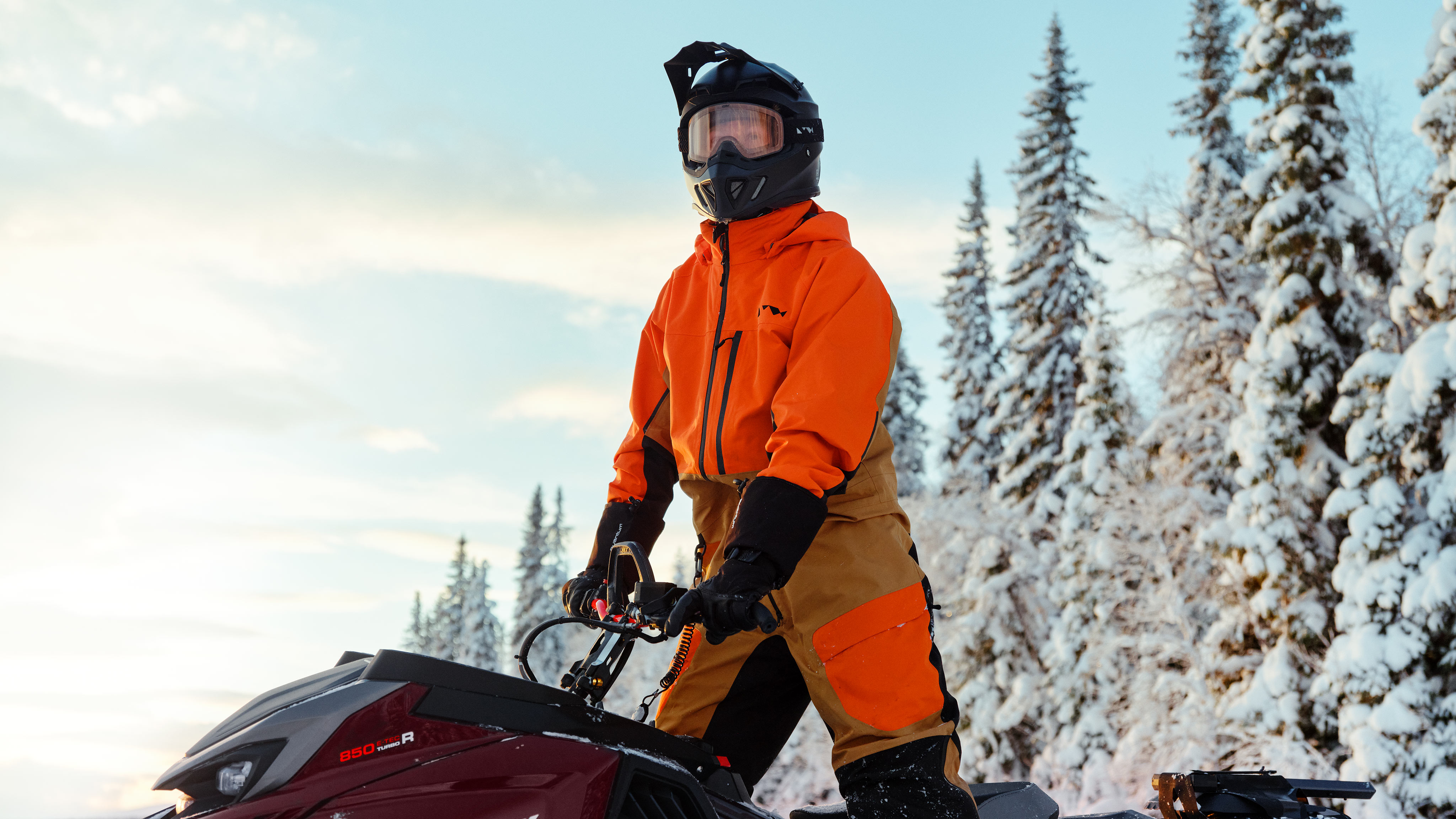 Man going up a hill with a Lynx Shredder