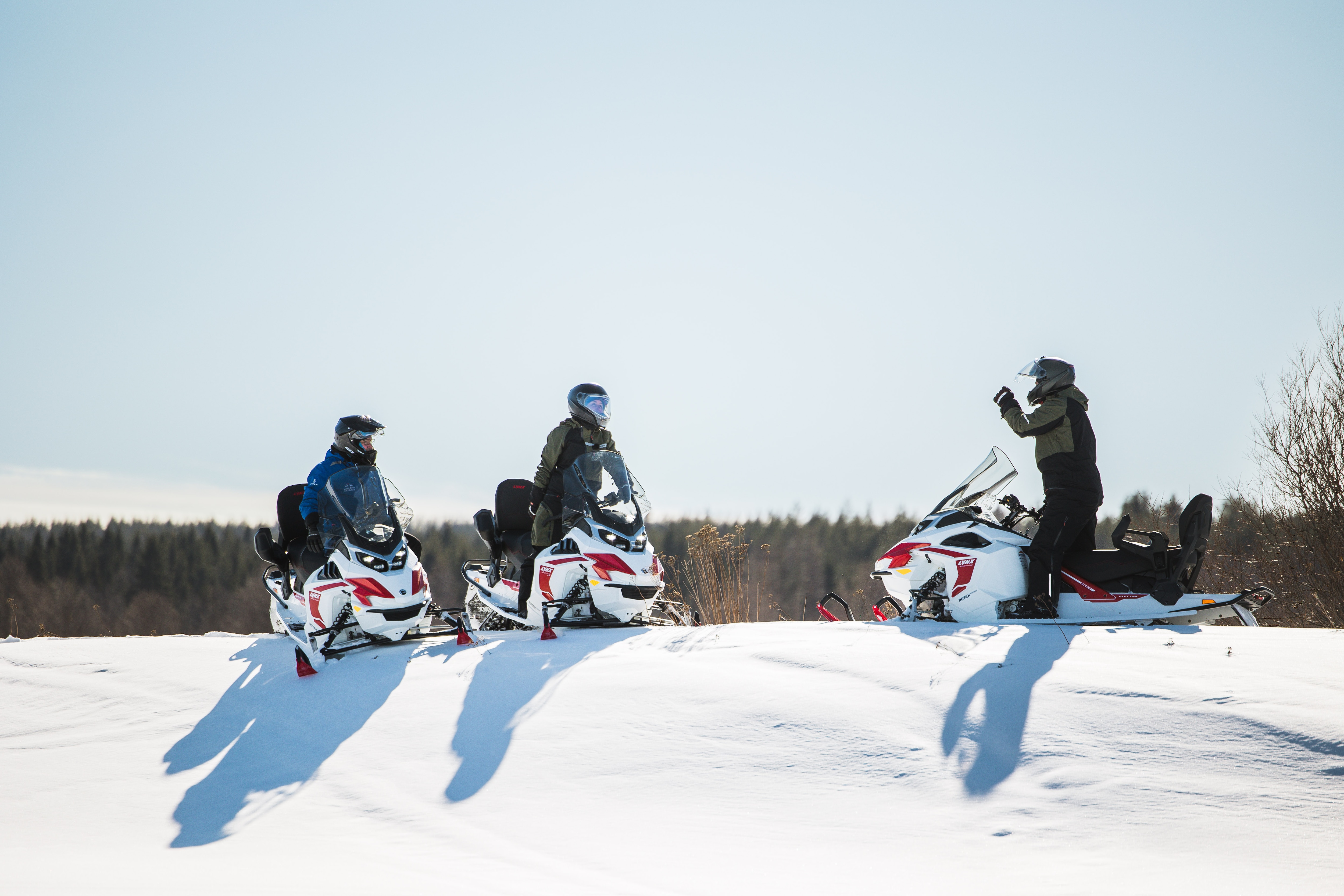 Three riders on their Lynx Adventure Electrics