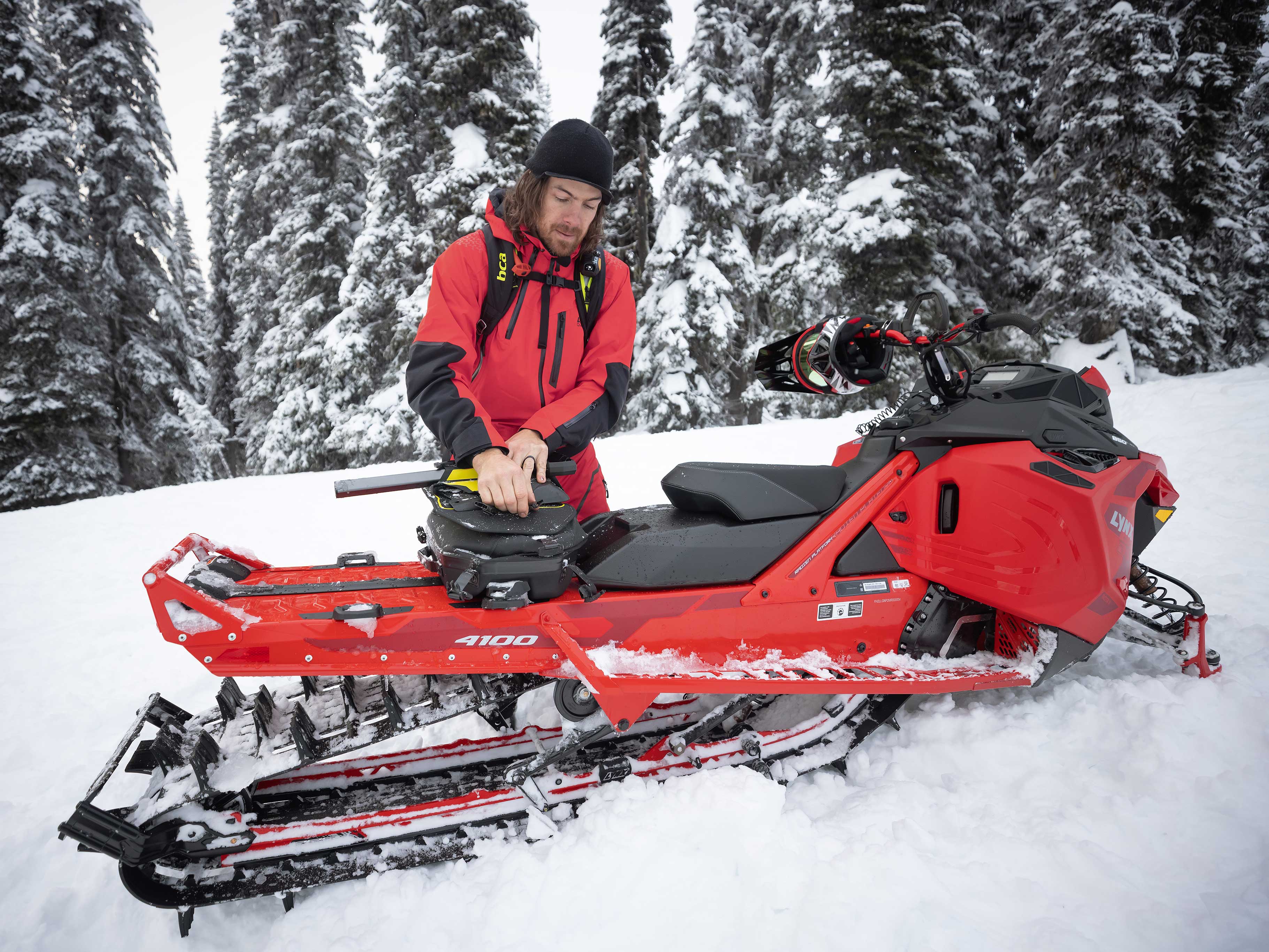Man using Lynx Accessories before a snowmobile ride