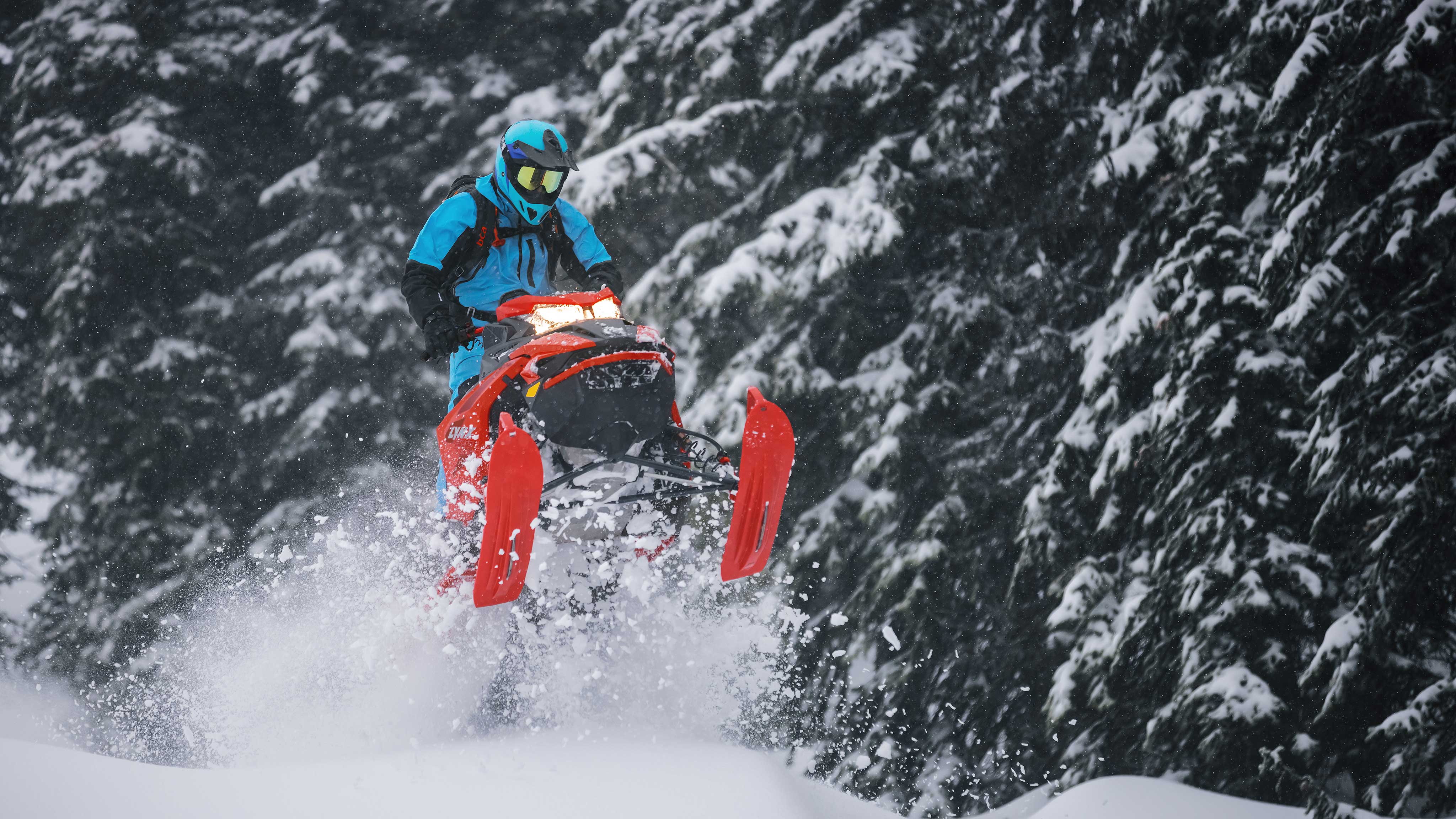 Man jumping with his 2022 Lynx BoonDocker in Deep-Snow 