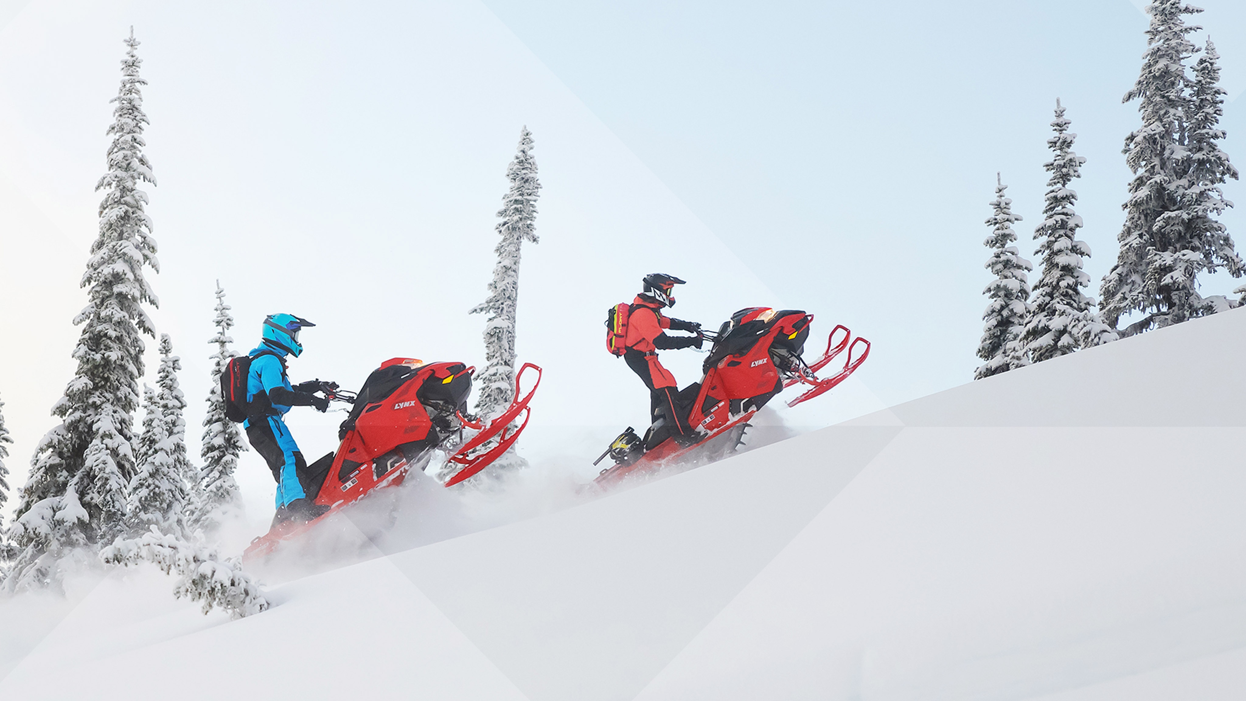 2 riders riding Lynx snowmobile in Deep-Snow