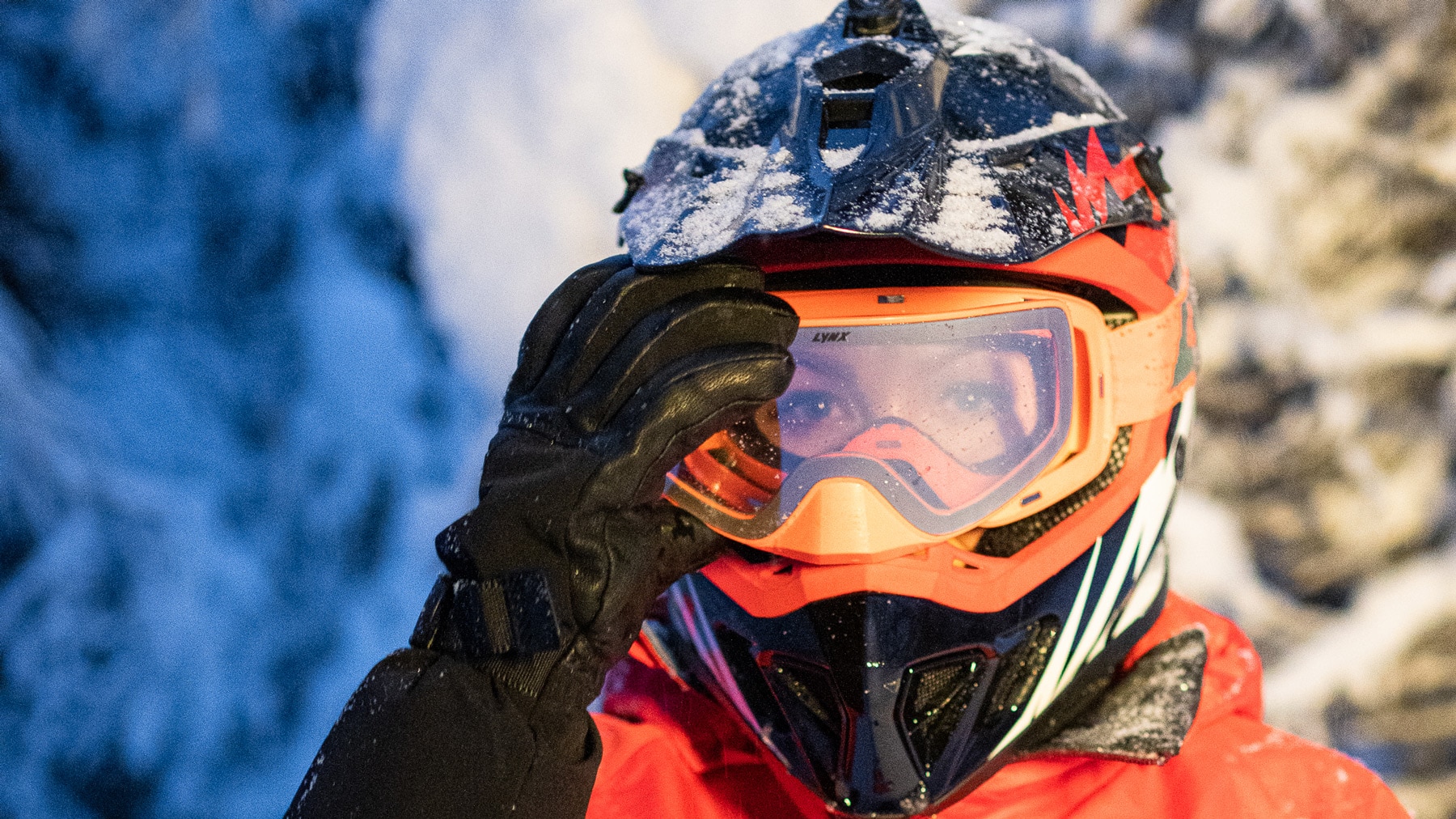 Woman wearing helmet and goggles