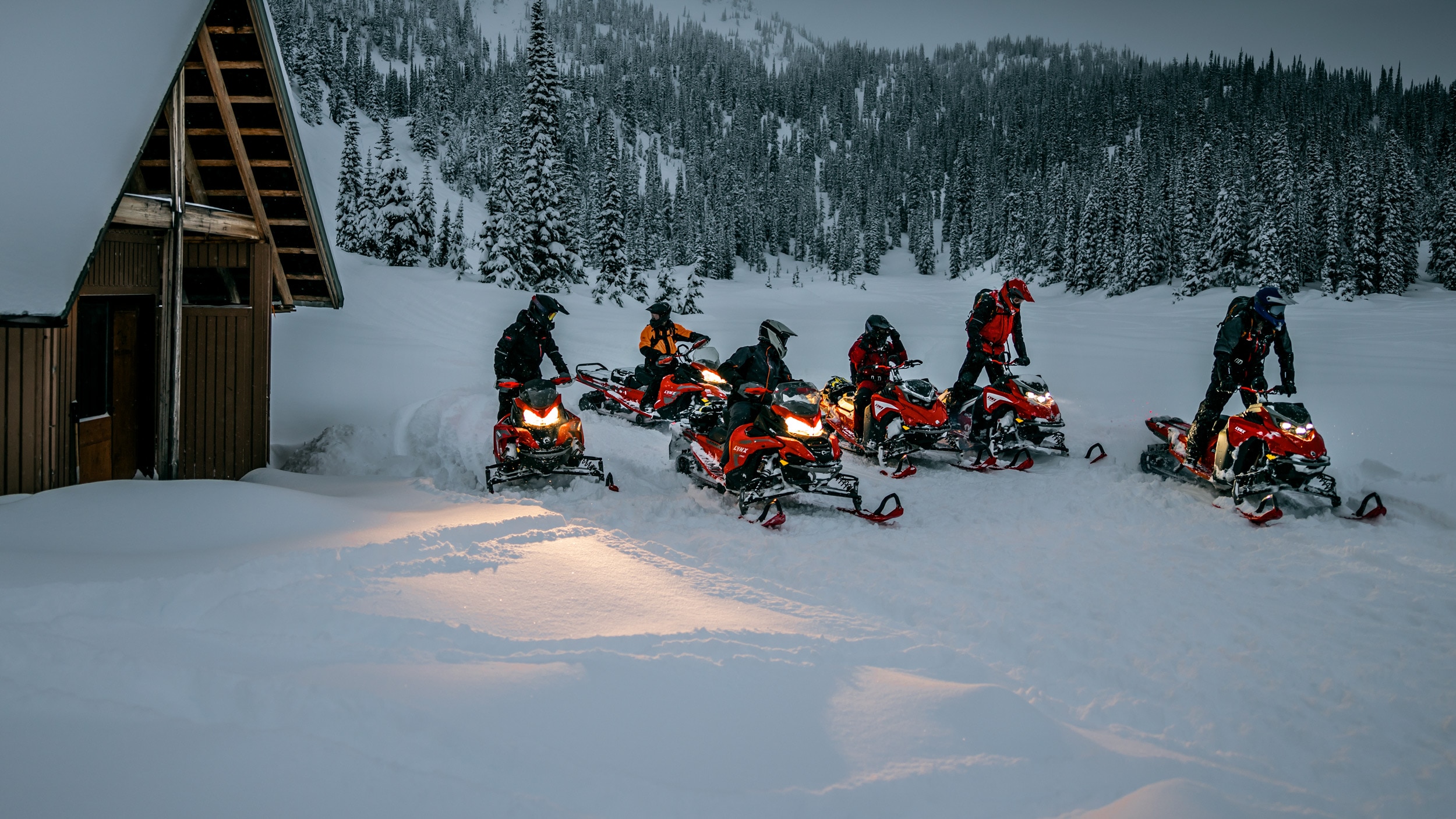 Group riding the new 2023 Lynx Snowmobiles