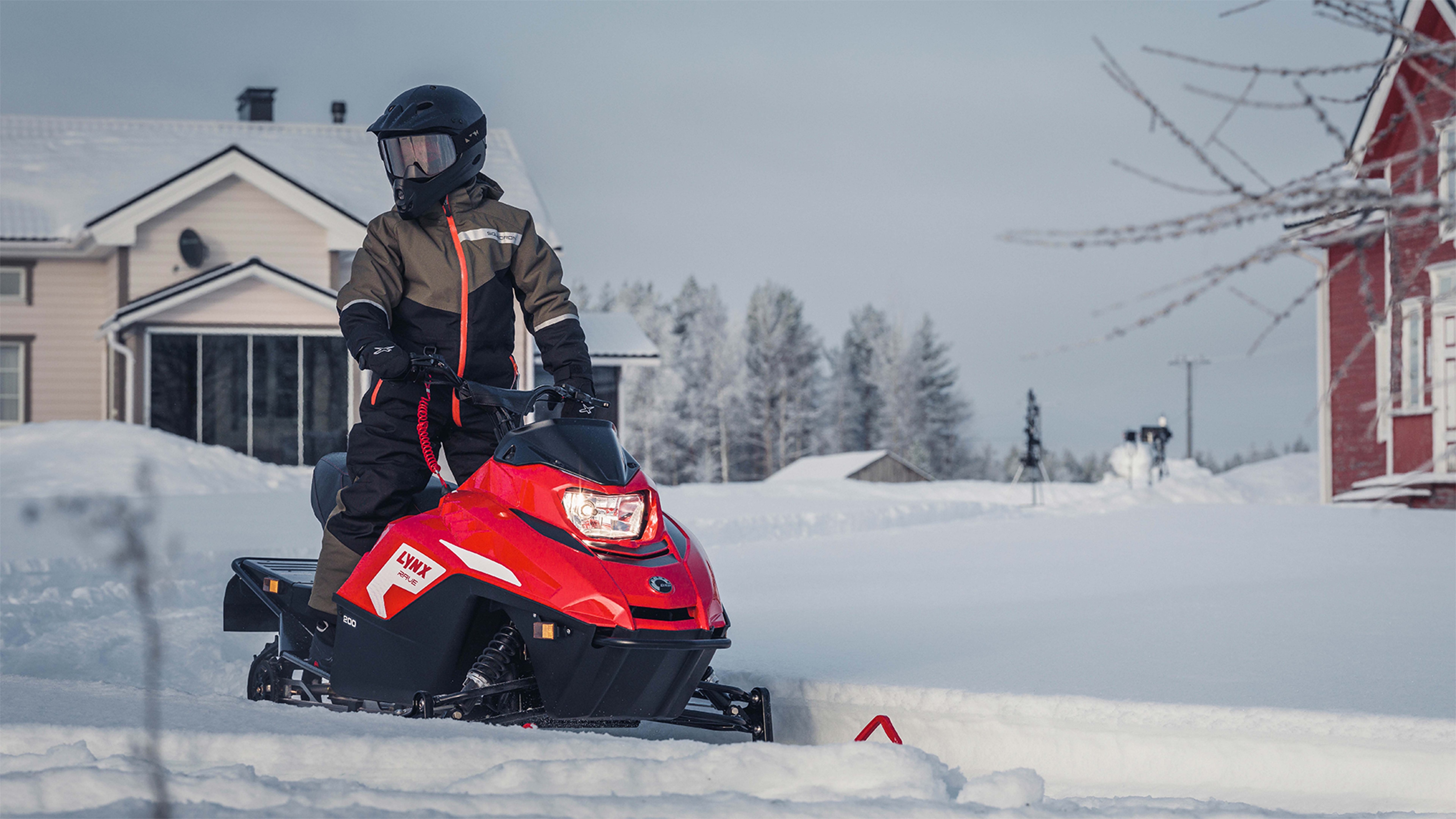 Kids riding on the yard with Lynx Rave 200