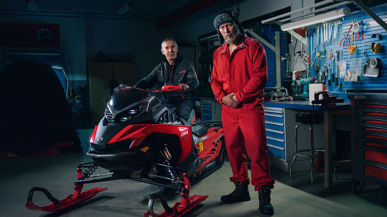 Snowmobile maintenance in a workshop